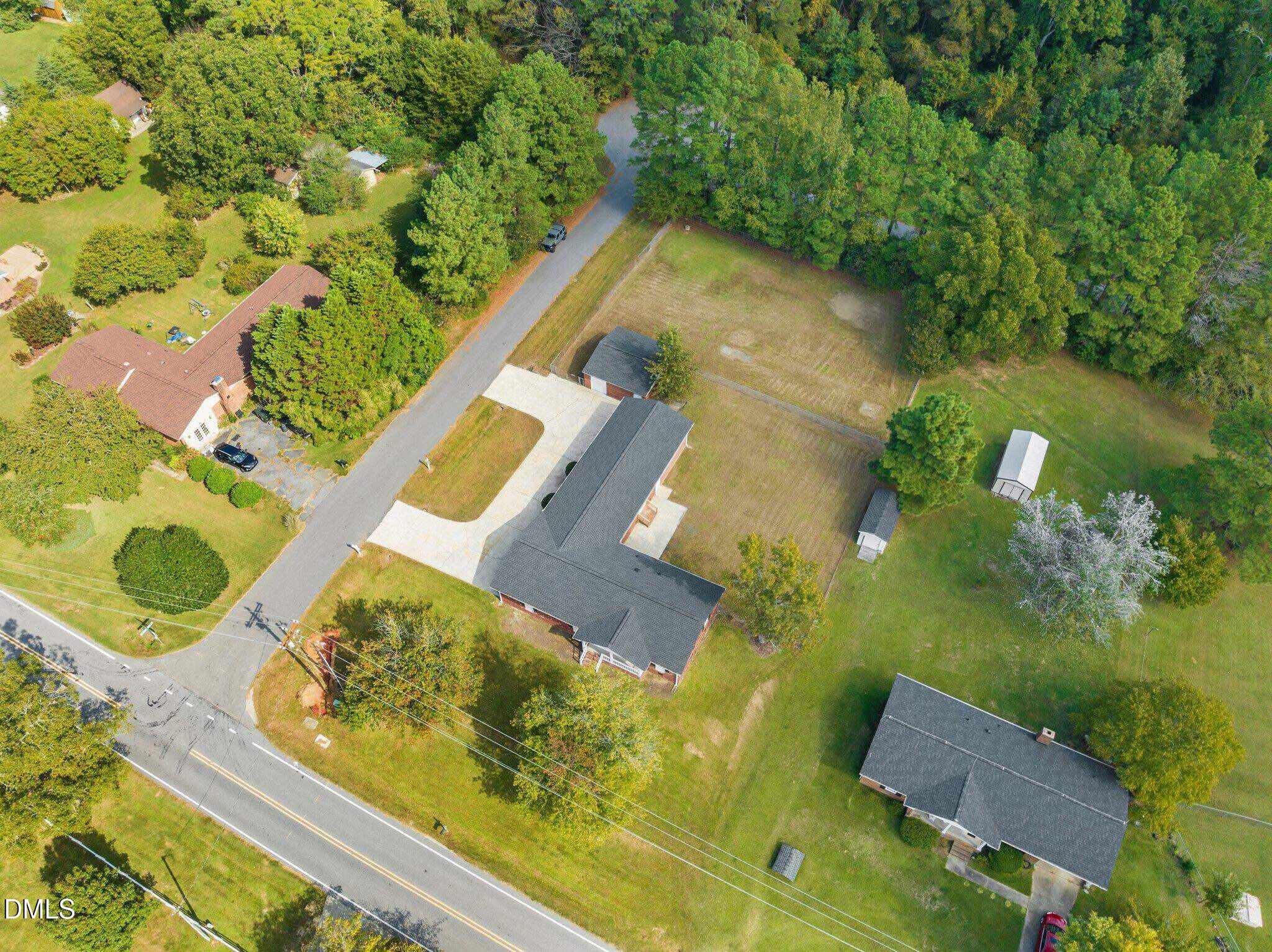 6501 Rock Service Station Road Raleigh, NC 27603 - Photo 21 of 49 an aerial view of a house having yard