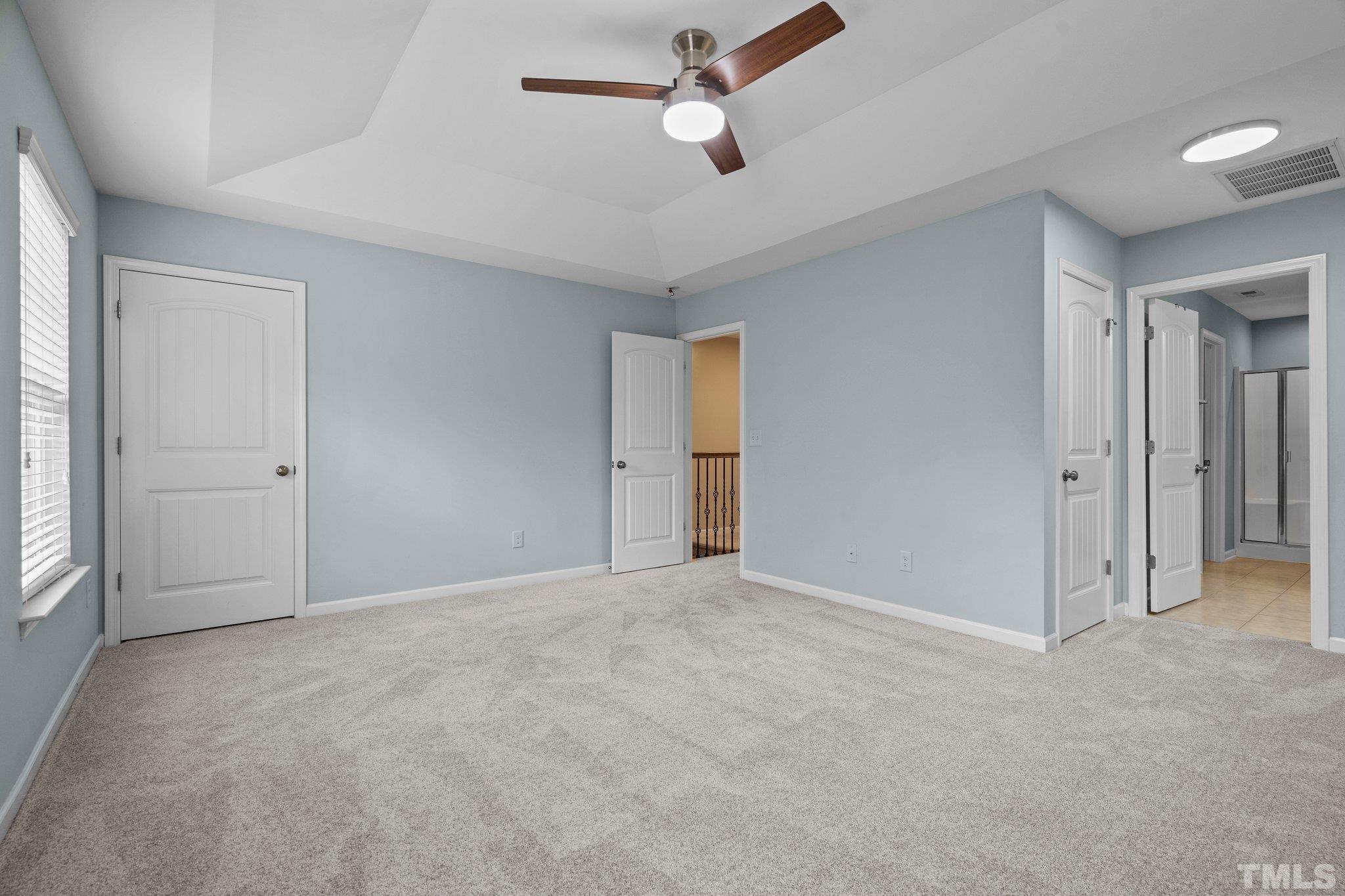 2421 Memory Ridge Drive Raleigh, NC 27606 - Photo 12 of 31 a view of an empty room and chandelier fan