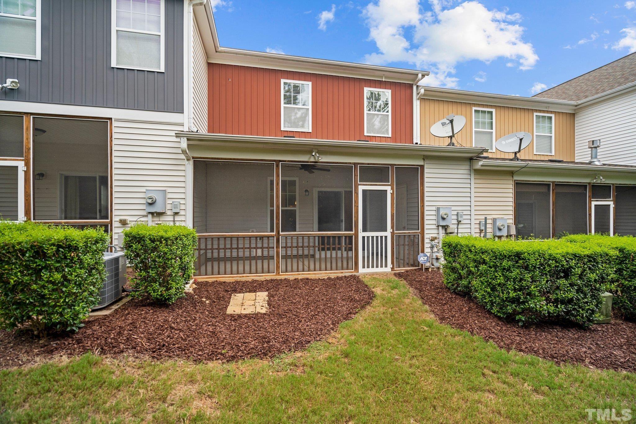 2421 Memory Ridge Drive Raleigh, NC 27606 - Photo 20 of 31 a front view of a house with garden