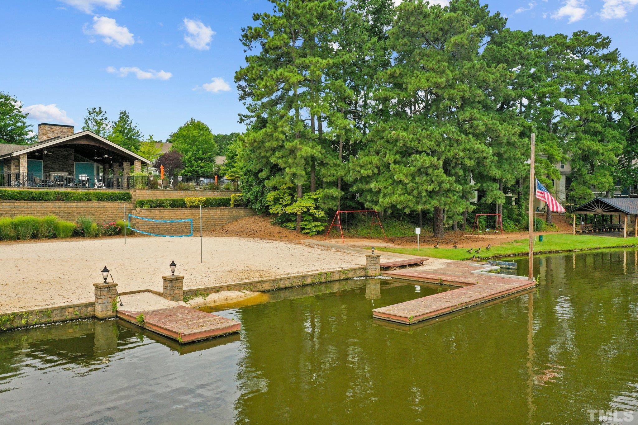 2421 Memory Ridge Drive Raleigh, NC 27606 - Photo 26 of 31 a view of a house with swimming pool and sitting area