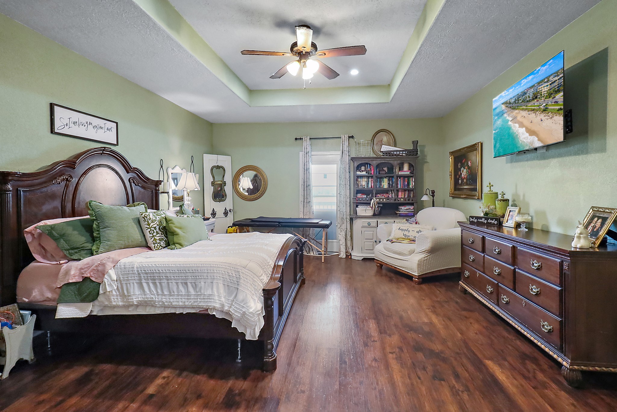 13659 Todd Road Winnie, TX 77665 - Photo 12 of 42 a bedroom with a bed and wooden floor