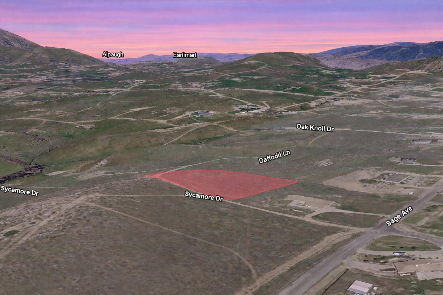 Sycamore Drive Tehachapi, CA 93561 - Photo 2 of 11 a view of a road with an ocean