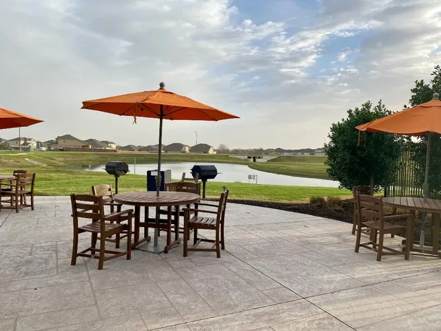 a view of a lake with a big yard