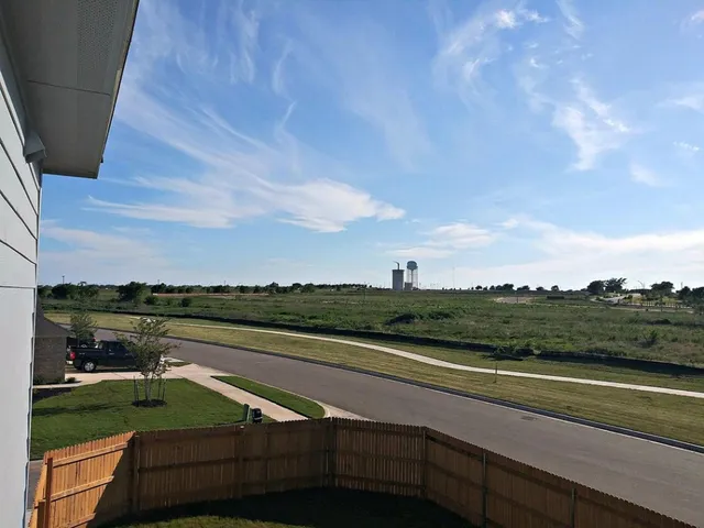 a view of outdoor space and yard