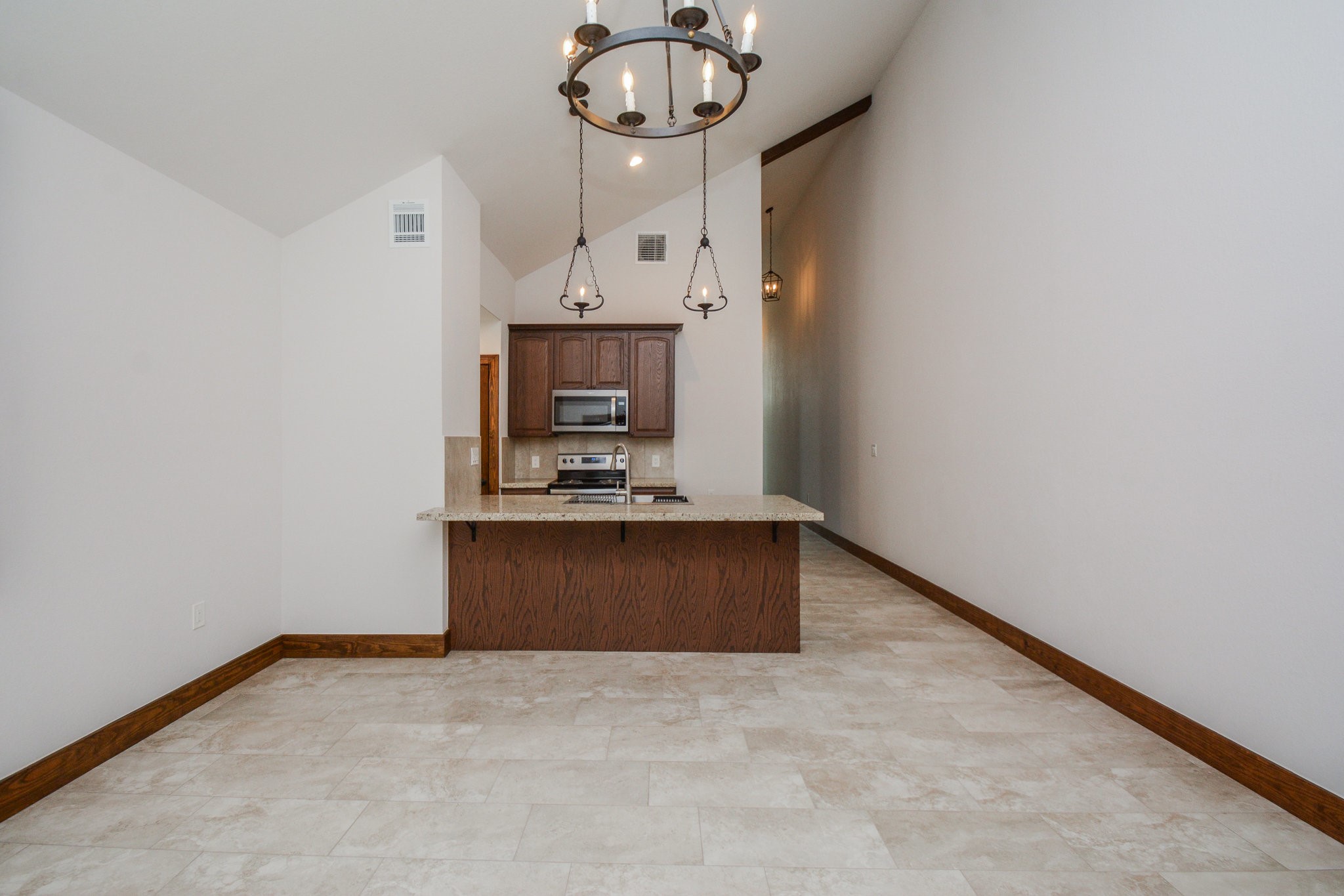 29529 B Turnbury Village Drive Spring, TX 77386 - Photo 30 of 32 a view of an empty room with a fireplace and a window