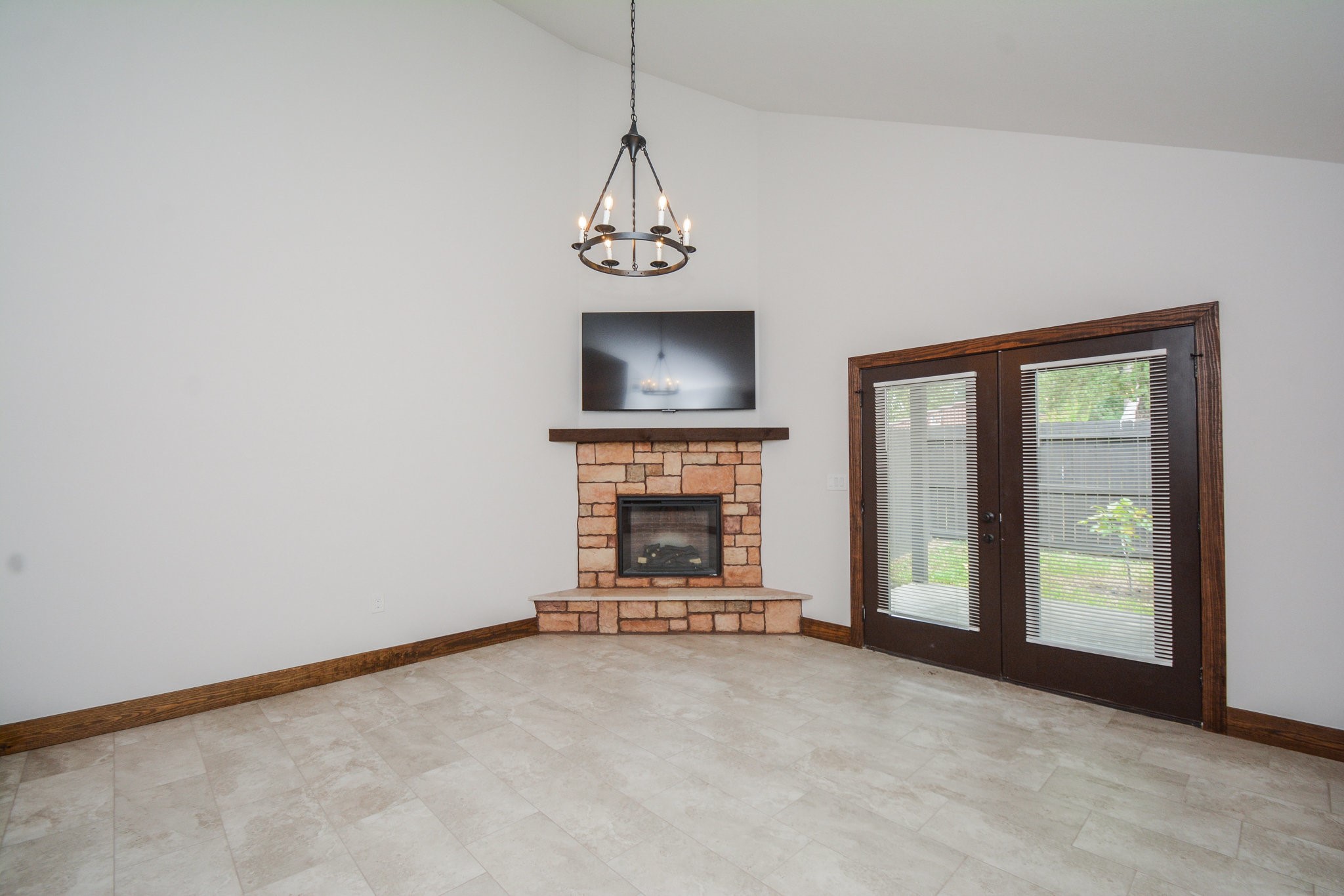 29529 B Turnbury Village Drive Spring, TX 77386 - Photo 32 of 32 a view of an empty room with a fireplace