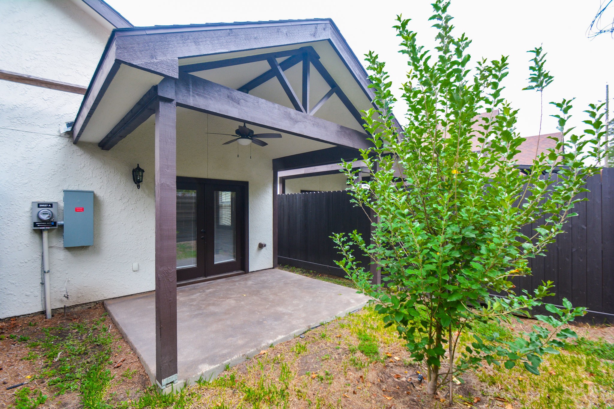 29529 B Turnbury Village Drive Spring, TX 77386 - Photo 5 of 32 a front view of a house with a yard