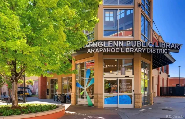 a tall building sitting on the side of a street