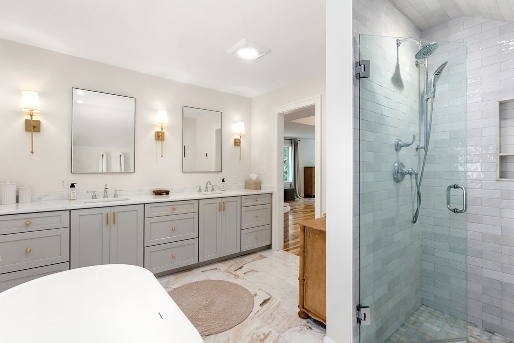 63 Moore Road Wayland, MA 01778 - Photo 23 of 36 a spacious bathroom with a sink a toilet and shower