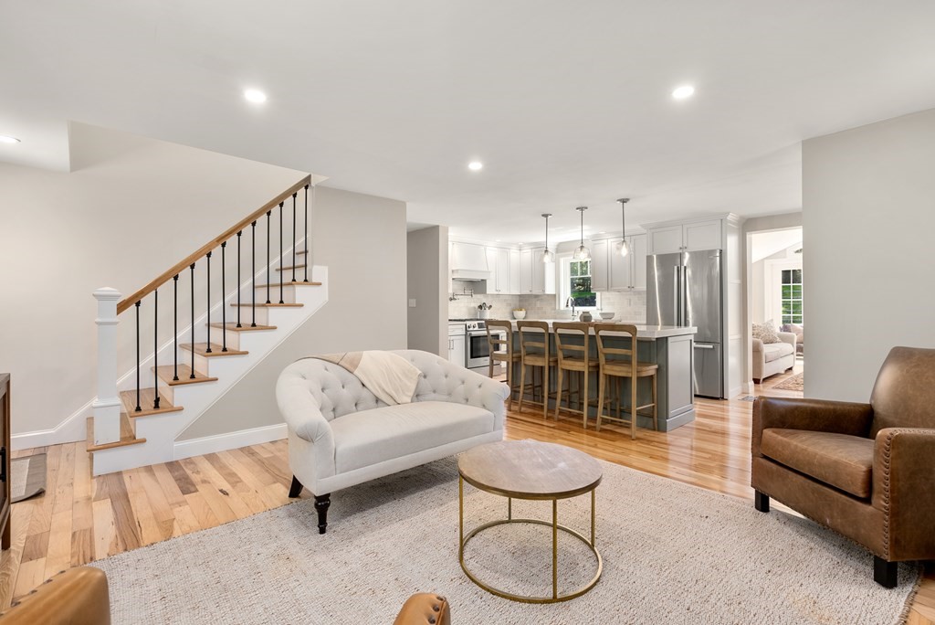 63 Moore Road Wayland, MA 01778 - Photo 3 of 36 a living room with furniture and kitchen view
