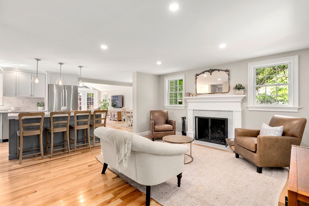 63 Moore Road Wayland, MA 01778 - Photo 5 of 36 a living room with furniture and a fireplace