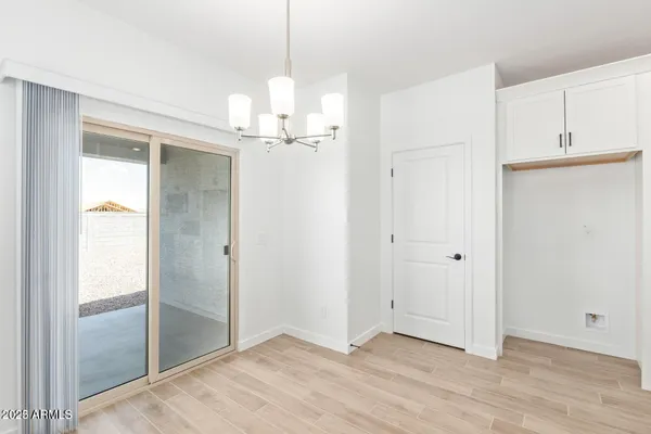 a view of a room with an empty space