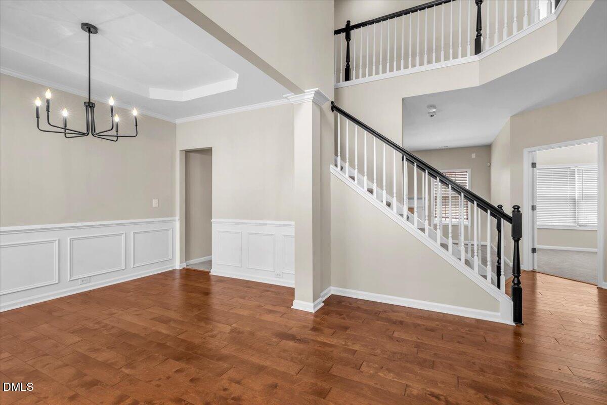 708 Straywhite Avenue Apex, NC 27539 - Photo 9 of 69 a view of an entryway with wooden floor