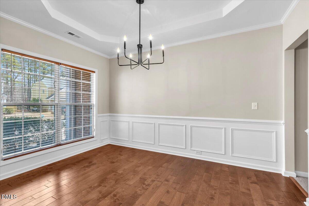 708 Straywhite Avenue Apex, NC 27539 - Photo 10 of 69 a view of an empty room with a window