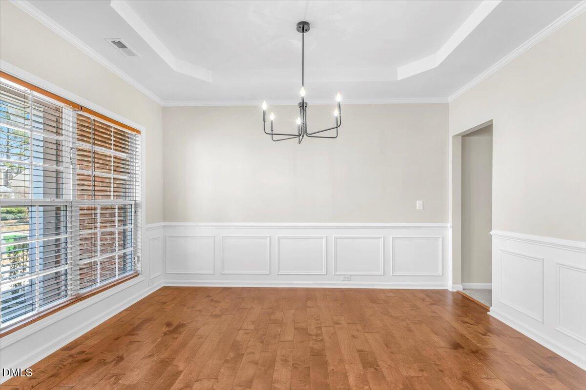 708 Straywhite Avenue Apex, NC 27539 - Photo 11 of 69 a view of an empty room with a window