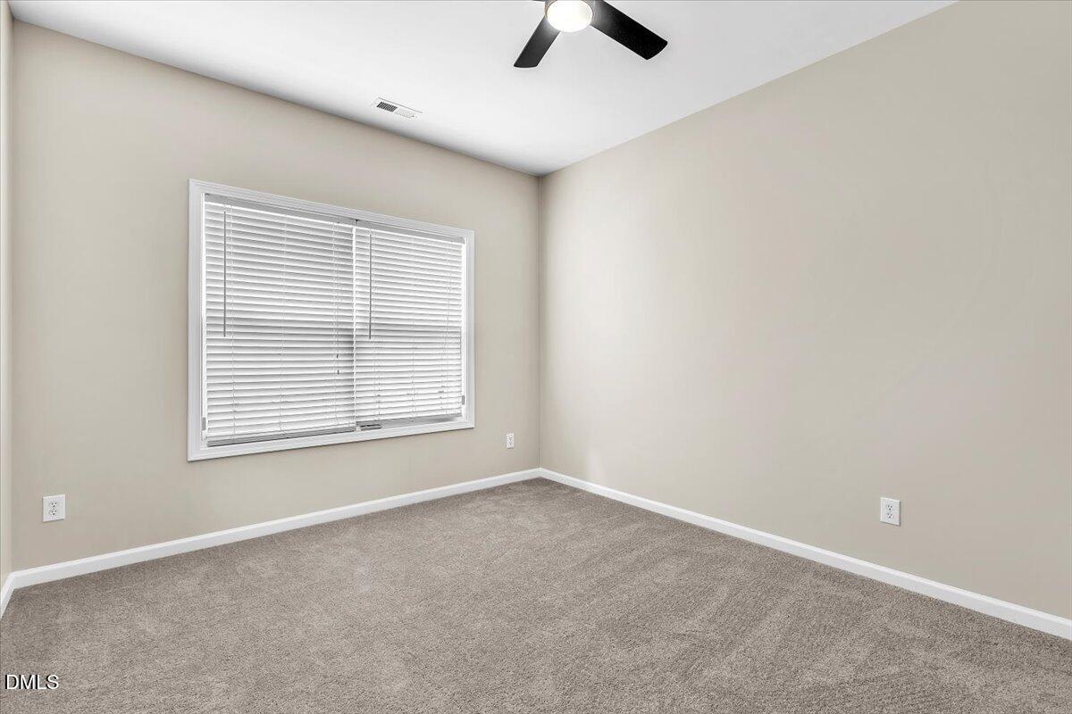 708 Straywhite Avenue Apex, NC 27539 - Photo 28 of 69 an empty room with a window