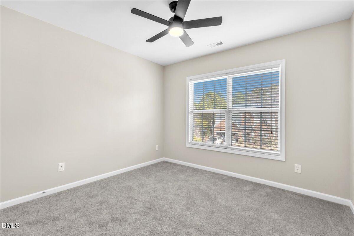 708 Straywhite Avenue Apex, NC 27539 - Photo 55 of 69 a view of an empty room with a window