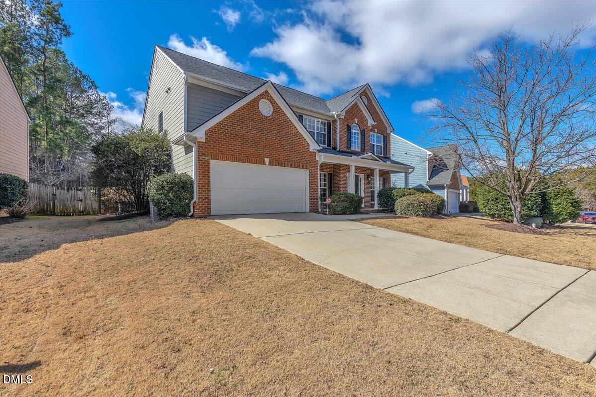 708 Straywhite Avenue Apex, NC 27539 - Photo 63 of 69 a front view of a house with a yard