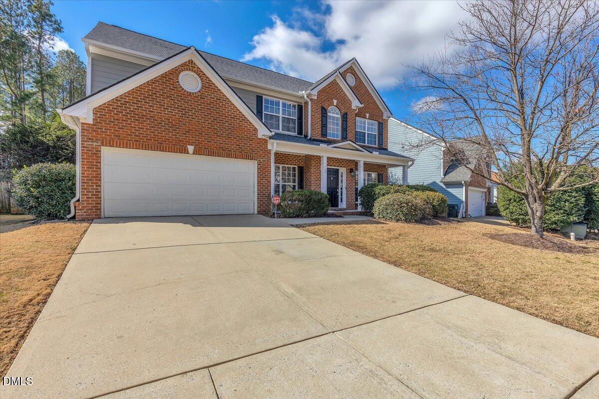708 Straywhite Avenue Apex, NC 27539 - Photo 64 of 69 a front view of a house with a yard