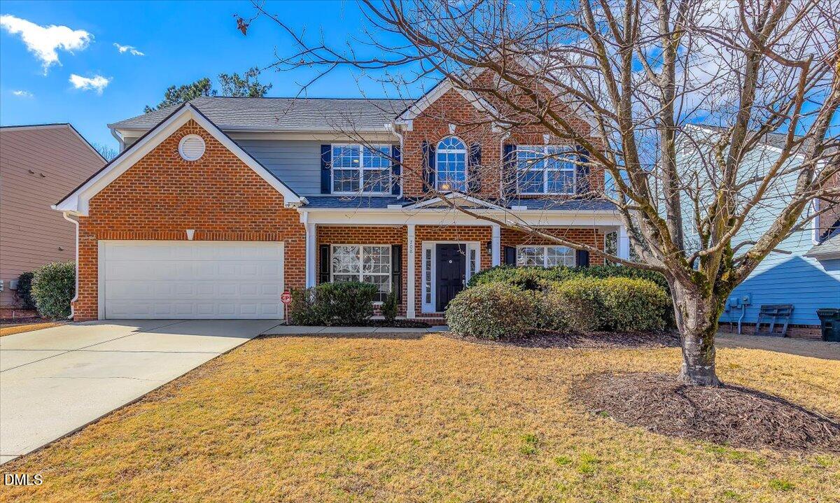708 Straywhite Avenue Apex, NC 27539 - Photo 65 of 69 a front view of a house with a yard