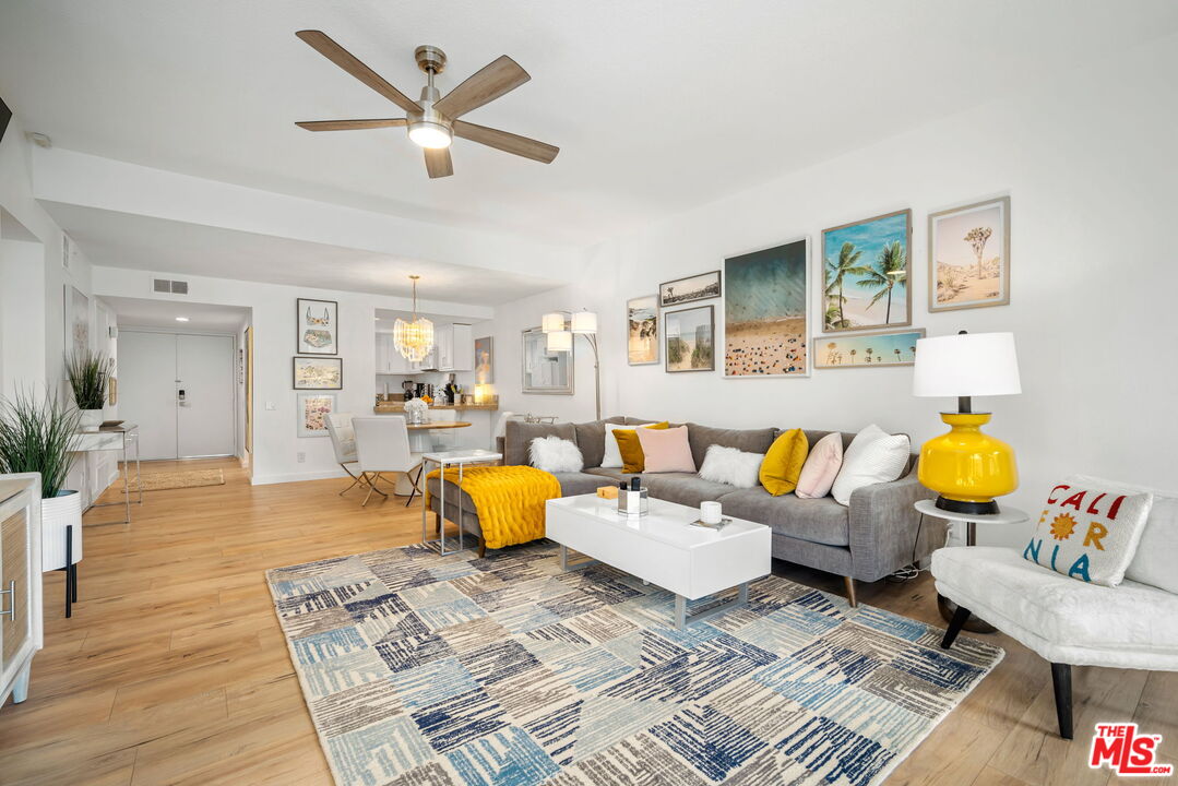 60 La Ronda Drive Rancho Mirage, CA 92270 - Photo 4 of 57 a living room with furniture and kitchen view