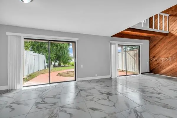 a kitchen with white cabinets