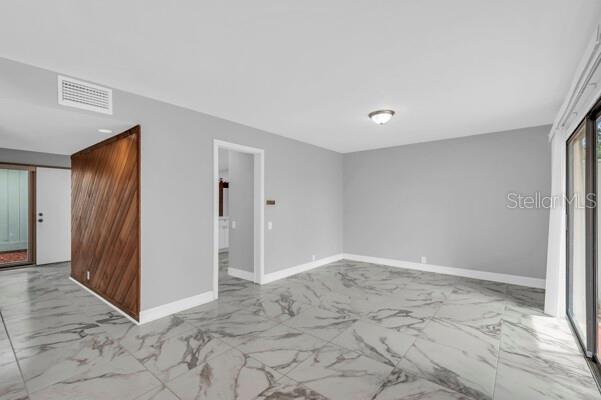 1502 Lake Buckeye Road, Unit 2 Winter Haven, FL 33881 - Photo 17 of 47 a view of an empty room