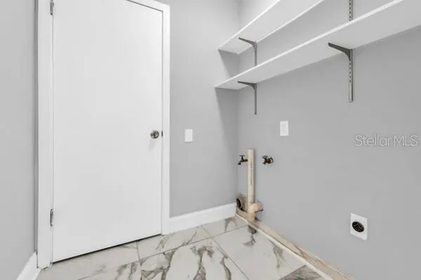 a bathroom with a sink and a shower