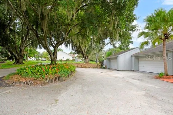 a view of outdoor space with deck and yard