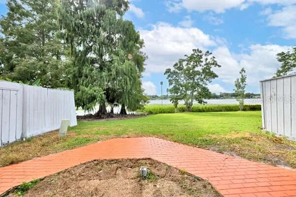 a view of a lake with a big yard