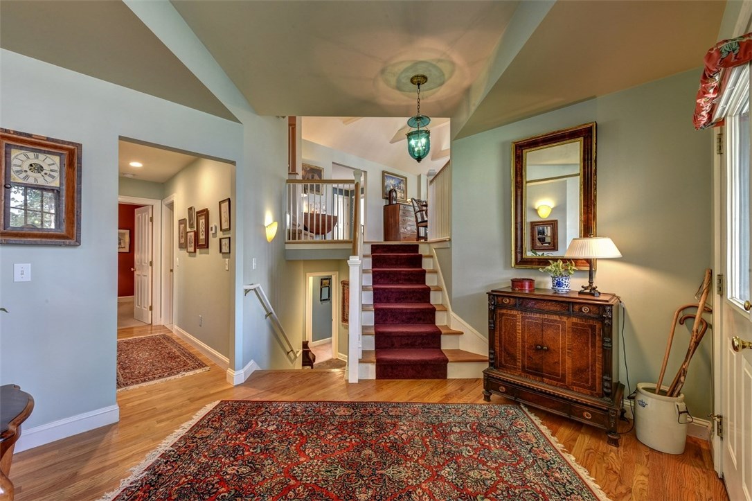 27 Oyster Point Warren, RI 02885 - Photo 4 of 40 From foyer to main part of home. Notice ceiling detail.