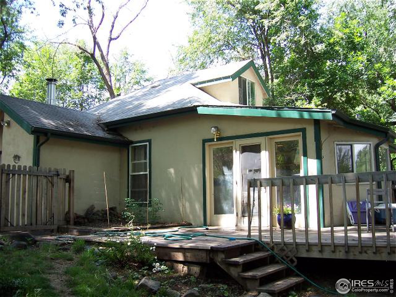 6025 Valmont Road Boulder, CO 80301 - Photo 6 of 6 a front view of a house with a yard