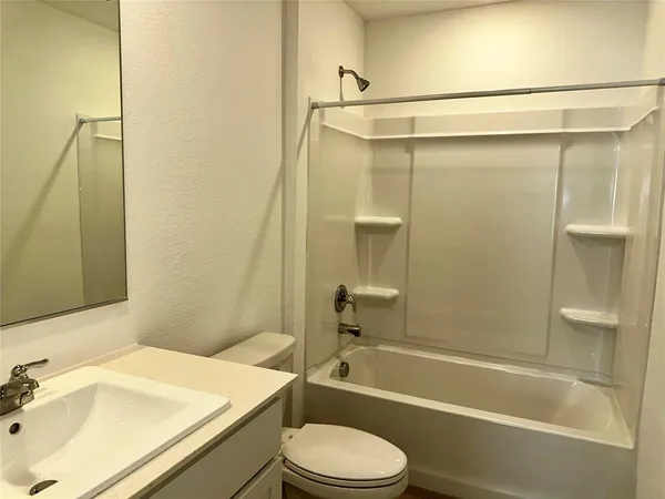 an empty room with a empty space and window