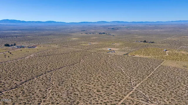 a view of an ocean and a mountain