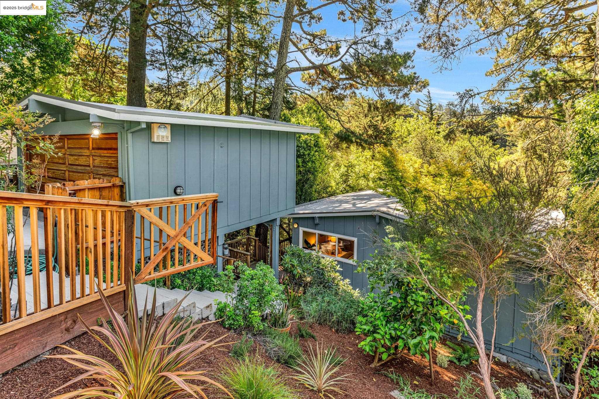 2211 Arrowhead Drive Oakland, CA 94611 - Photo 3 of 52 View of outbuilding featuring view of wooded area
