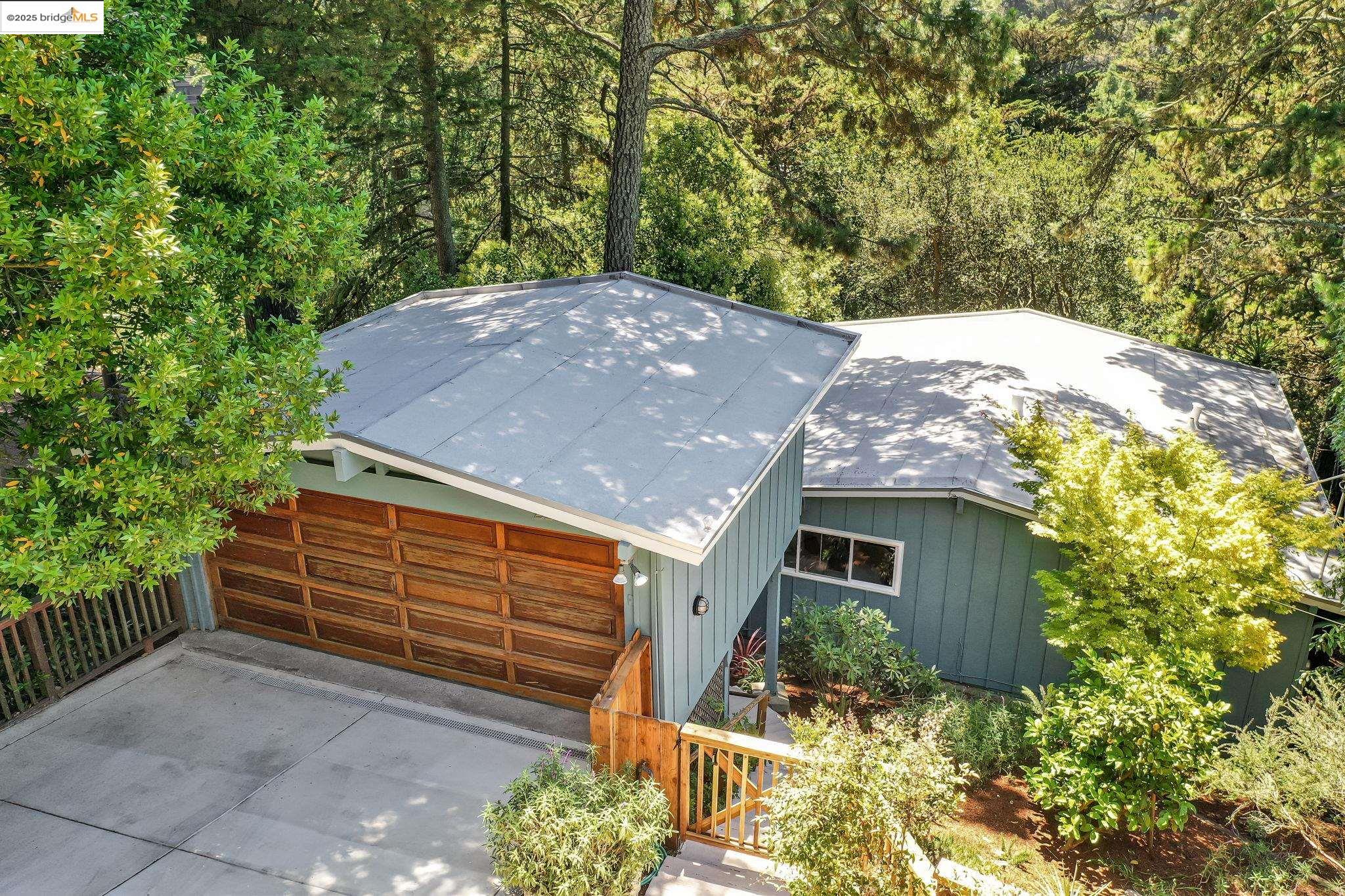 2211 Arrowhead Drive Oakland, CA 94611 - Photo 46 of 52 Garage with concrete driveway