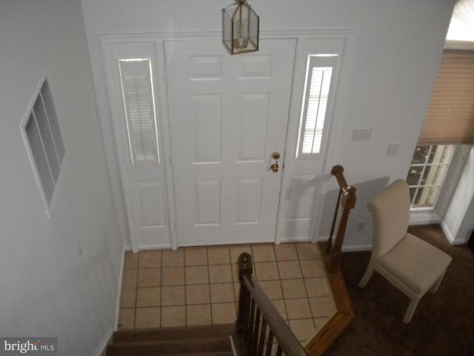13711 Springhaven Drive Chantilly, VA 20151 - Photo 2 of 22 ceramic tile in two story foyer