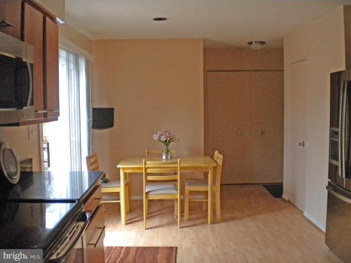 13711 Springhaven Drive Chantilly, VA 20151 - Photo 11 of 22 double doors in back of photo house the laundry