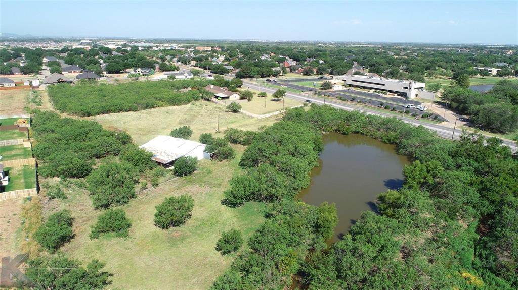 3469 Antilley Road Abilene, TX 79606 - Photo 3 of 9 an aerial view of residential houses with outdoor space and trees