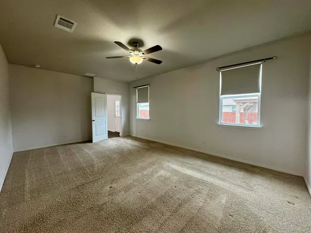 a bathroom with a sink a mirror and a shower