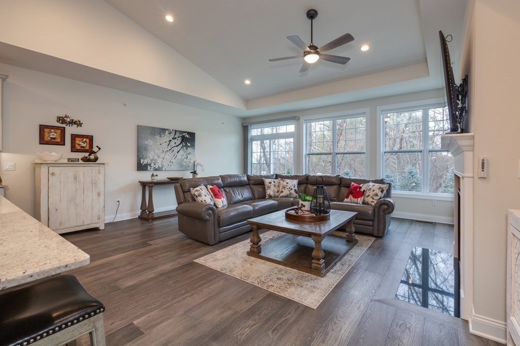 3 Hummingbird Way, Unit 3 Methuen, MA 01844 - Photo 14 of 36 a living room with furniture and a fireplace