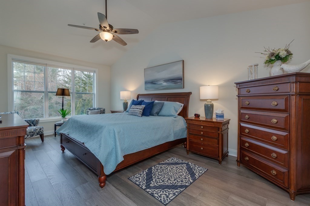3 Hummingbird Way, Unit 3 Methuen, MA 01844 - Photo 15 of 36 a bedroom with a bed dresser and a window