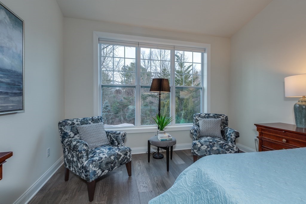 3 Hummingbird Way, Unit 3 Methuen, MA 01844 - Photo 16 of 36 a living room with furniture and a window