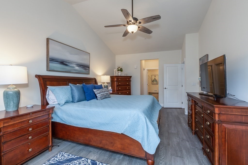 3 Hummingbird Way, Unit 3 Methuen, MA 01844 - Photo 17 of 36 a bedroom with a bed and a flat screen tv