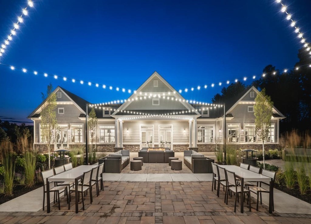 3 Hummingbird Way, Unit 3 Methuen, MA 01844 - Photo 31 of 36 a view of a dining room with furniture and chandelier
