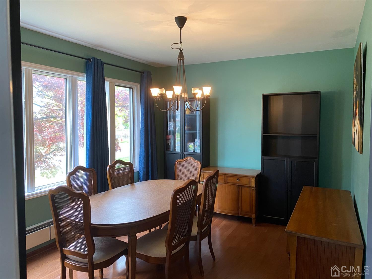 332 New Market Road Dunellen, NJ 08812 - Photo 7 of 16 a dining room with furniture and window