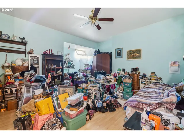 a living room with lots of furniture and a chandelier