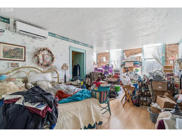 a bathroom with a sink mirror vanity and toilet