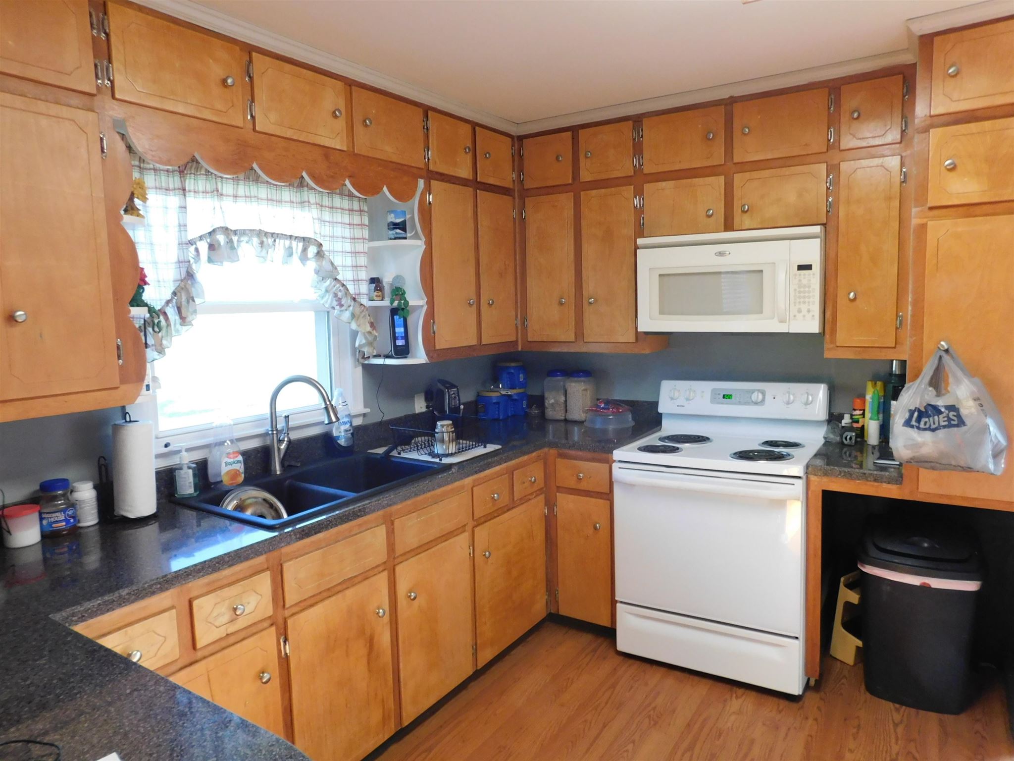 7306 Cross Keys Road Mount Crawford, VA 22841 - Photo 7 of 15 a kitchen with a sink cabinets and window