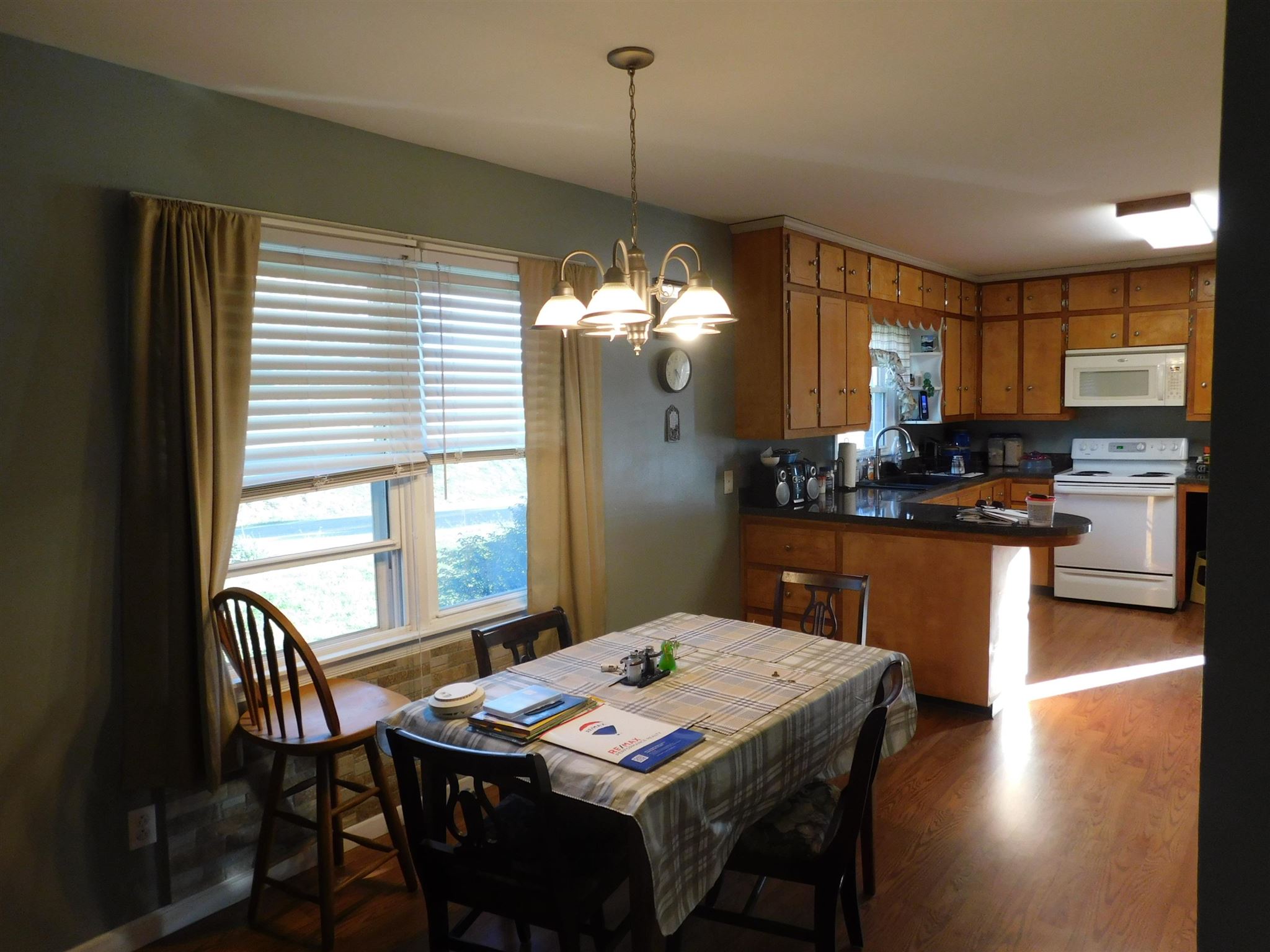 7306 Cross Keys Road Mount Crawford, VA 22841 - Photo 8 of 15 a view of a dining room with furniture window and wooden floor